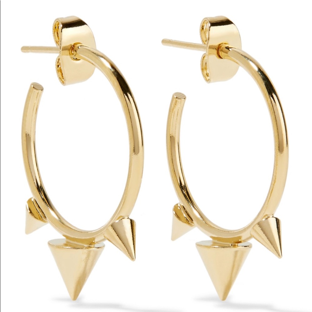 Isabel Marant gold time on brass spike earrings.
